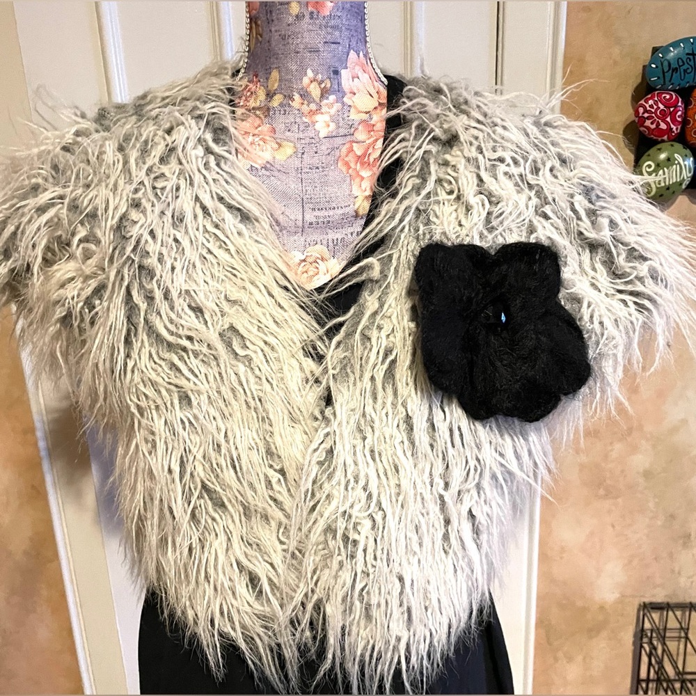 Woman’s sweater vest with fun fur on front- size medium- cute layering piece
